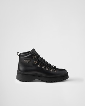 Prada Brixxen Leather Booties Black