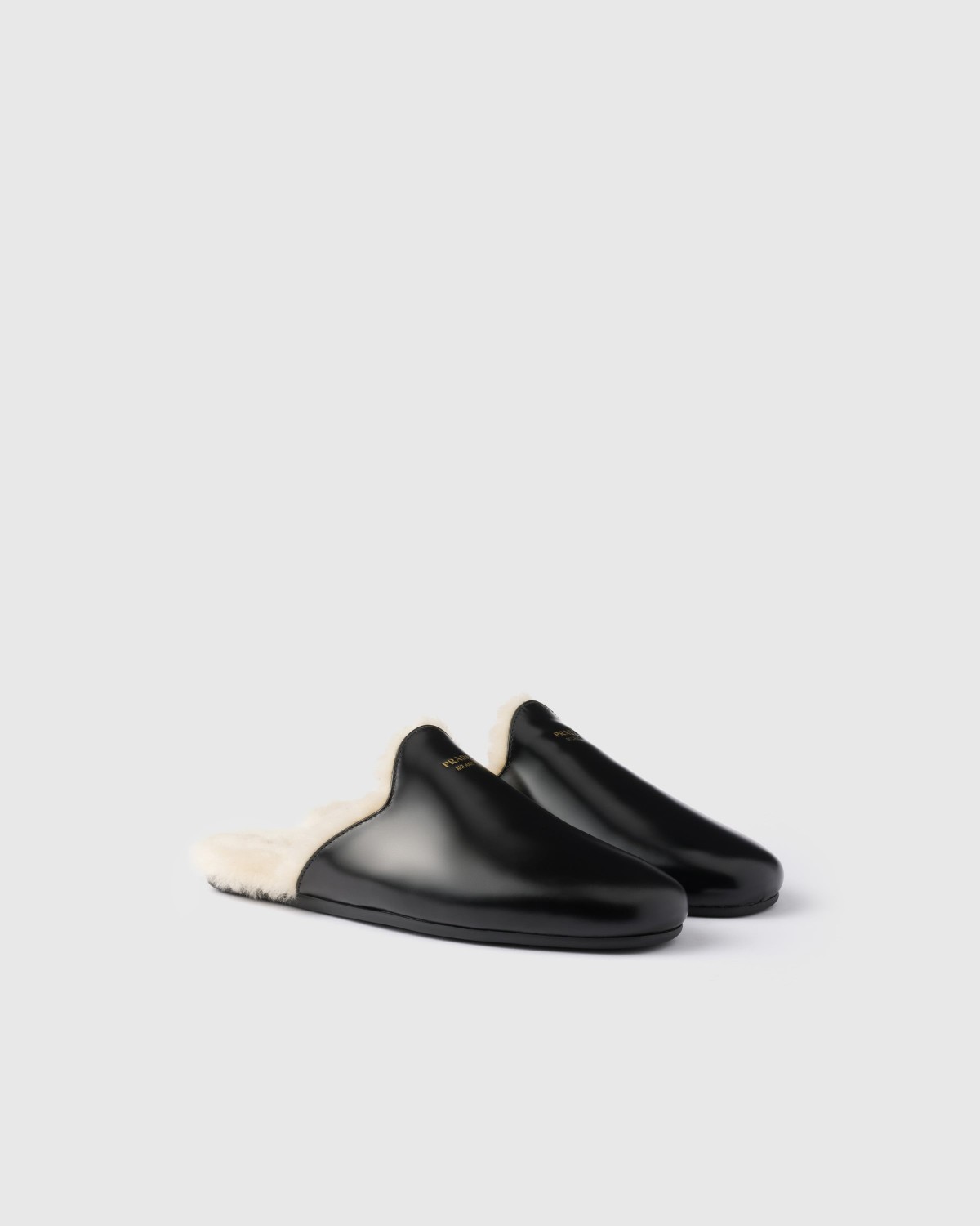 Prada Brushed Leather And Shearling Mules Black