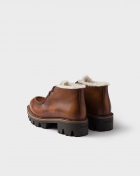 Prada Leather And Shearling Booties Cognac
