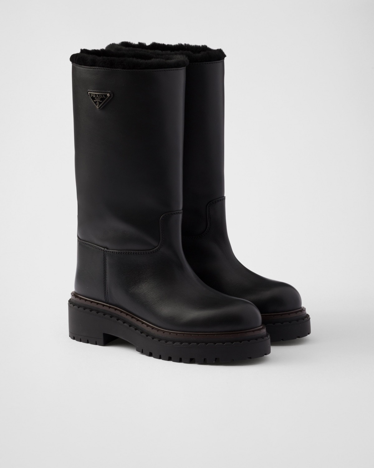 Prada Leather And Shearling Boots Black