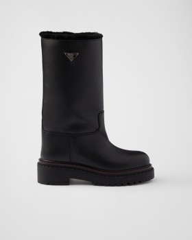 Prada Leather And Shearling Boots Black