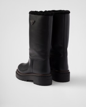 Prada Leather And Shearling Boots Black