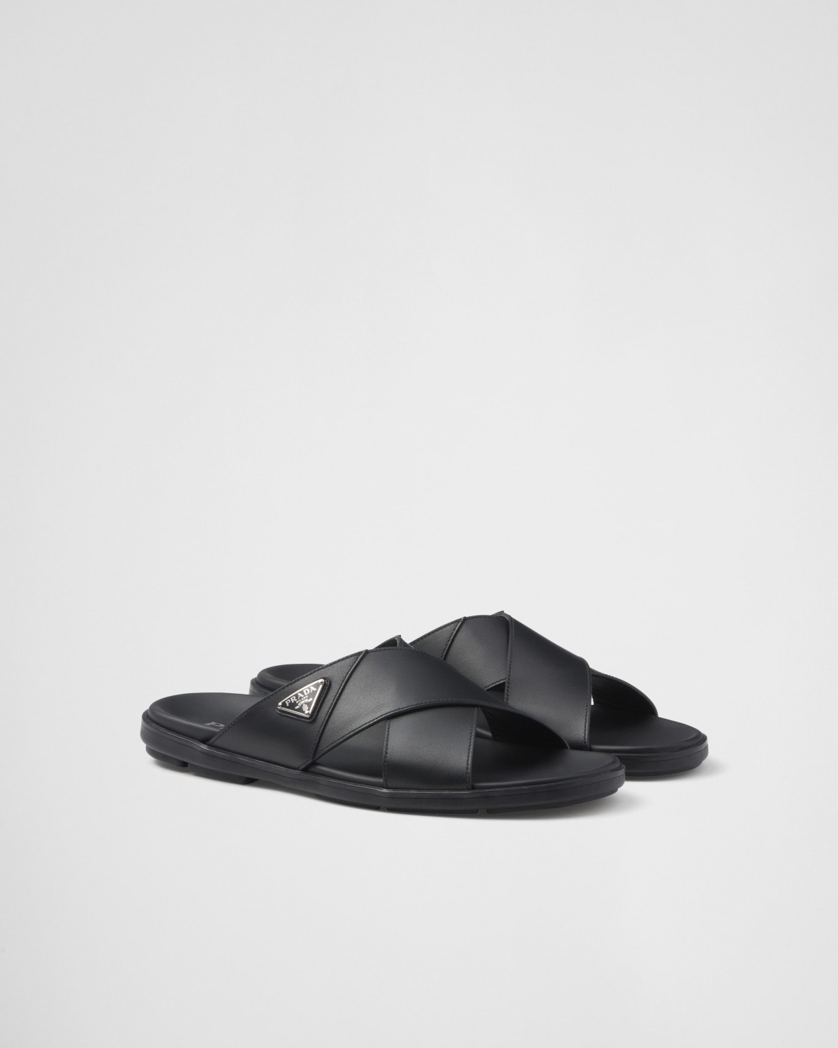 Prada Leather Crisscross Slides Black