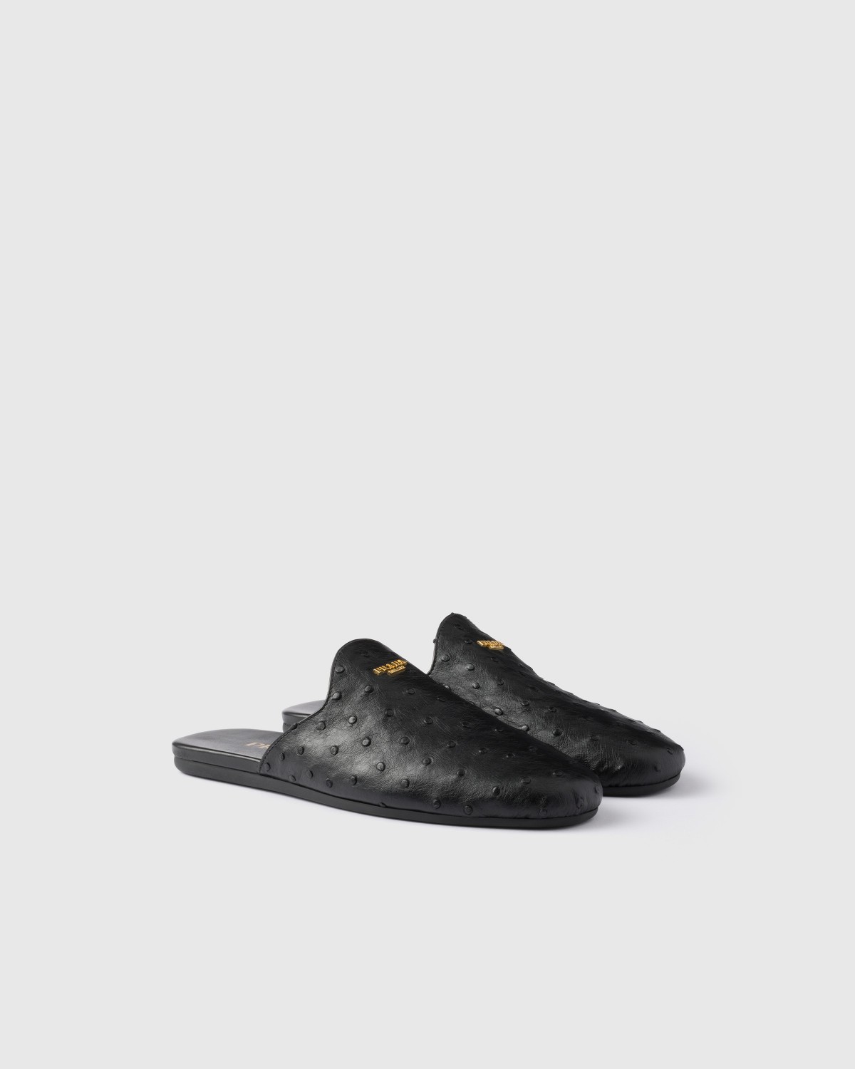 Prada Ostrich Leather Mules Black